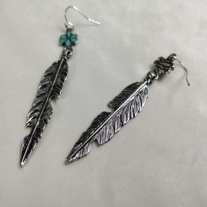 Antieke zilveren veer oorbelle - Vintage Fashion Jewelry Brands recensie en prijs